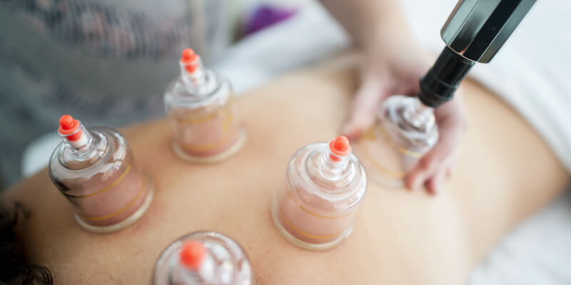 Massage treatment with various suction cups