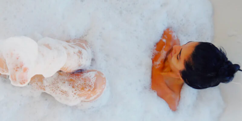 Woman in a whirlpool bath